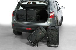 Carbags reistassenset Nissan Qashqai (J10) SUV 2007 t/m 2013 Carbags reistassenset Nissan Qashqai (J10) SUV 2007 t/m 2013